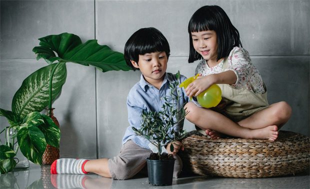 Kids Watering Plants