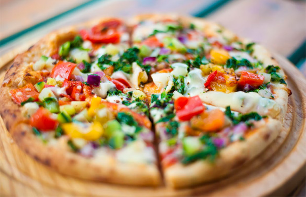 Homemade Pizza with vegetables and fresh mozzarella cheese