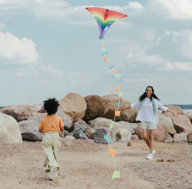 kite flying on the beach - fun beach activities for kids