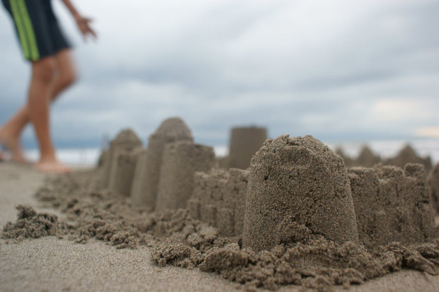 Sandcastle building beach activities for kids
